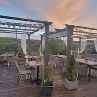 Unused outdoor dining due to rain at Weingut Trautwein - Restaurant & Hotel in Flonheim