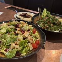 FATTOUSH SALAD •
lettuce, cucumbers, cherry tomatoes, red cabbage, lemon vinaigrette, pita crouton  at Figs in Jackson