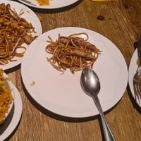 Left top: chow mein; left bottom: chicken Singapore rice; right: chilli pepper chips at Oriental Aroma in Royal Wootton Bassett