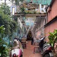 Entrance and outdoor seating   at Nook Eatery in Hue