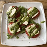 Vegan caprese!  Cashew cheese and pesto.  Yum #Veganuary at Two Dollar Radio Headquarters in Columbus
