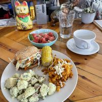 Bbq mushroom platter w watermelon salad, spicy Mac and chz and redskin dill potato salad   at Two Dollar Radio Headquarters in Columbus