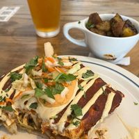 Tortuga and home fries with a draft beer at Two Dollar Radio Headquarters in Columbus