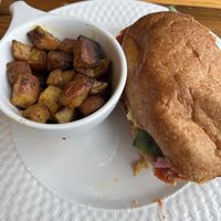 Weekly special: eggplant parm with home fries   at Two Dollar Radio Headquarters in Columbus
