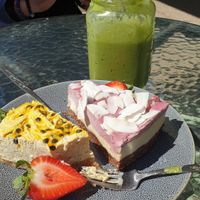 Passion fruit cheese cake, raspberry white chocolate cheese cake and  courage smoothie. at RAWR Bar in Apollo Bay
