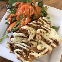 Lasagna and side salad at RAWR Bar in Apollo Bay