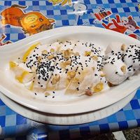 Mango sticky rice with coconut ice cream and black sesame seeds at Kohco Man in Koh Phayam