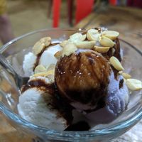 Coconut and taro icecream with chocolate and peanuts at Kohco Man in Koh Phayam
