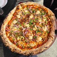 18" Hive Mind w/ cashew ricotta. a must try and best vegan pizza in town.  at King Dough in Indianapolis