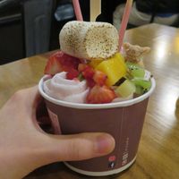 Coconut/ strawberry rolled ice cream with tropical fruit at Momotaro in State College