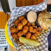Del burger and tots with yum sauce at Detroit Street Filling Station in Ann Arbor