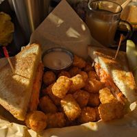 Bahn mi in exile sandwich with yum yum tots. So filling that I could barely eat the tots but I did my best! at Detroit Street Filling Station in Ann Arbor
