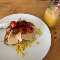 Savoury loaded croissant and Tropical Escape smoothie at Beetroot Sauvage in Edinburgh