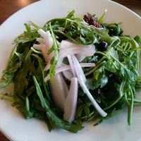 Arugula salad with shallots and pickled berries at Creekside Restaurant at Kalaloch Lodge in Forks