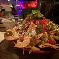 Amazing vegan nachos, with added seasoned soy strips. Best vegan nachos I’ve ever had!! at Geronimo's FGT   in Stockholm