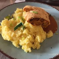 puffp astry roll filled up with sauerkraut and smoked tofu, mashed potatoes at Forrest Bistro in Prague