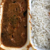 kind of mixed spicey vegetables such as Aubergine, potatos and more with rice  at Ganesha Restaurant - East in Stuttgart