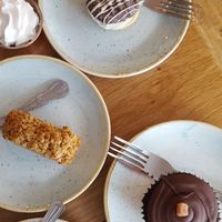 Vegan cakes - blueberry biscuit sandwich / flapjack / chocolate and ginger cupcake at The Copper Spoon in Marazion