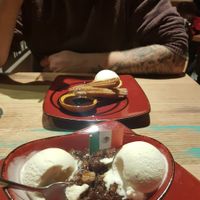 Vegan sticky date pudding with soy vanilla ice cream + vegan churros! at Montezuma's in Williams Landing