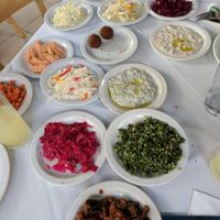 Variety of salads and hummus served  at Naurah in Abu Ghosh