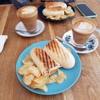 Humous and tomato panini and oatmilk lattes at Cafe Calluna in Pitlochry
