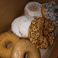 Lemon poppy, espresso, jelly filled, baby Ruth, and coconut  at Sugar Shack Donuts & Coffee in Richmond