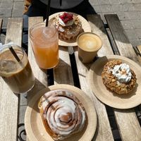 We got a iced latte with oat milk, normal coffee and delicious handmade Lemonade with Kiwi and Strawberry, sweet and good!   at Bite Me Cafe in Madrid