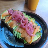 Tostada de aguacate con salmón at Bite Me Cafe in Madrid