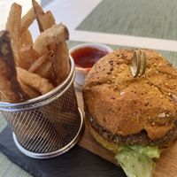 THE best vegan burger! Lentil patty on grain bun with melted cheese and mayo. Comes with fries.  at Garden Fresh Cafe in Palm Beach