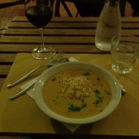 A flavorful Indian lentil dal with Italian wine. at Ghirba Biosteria della Gabella in Reggio Emilia