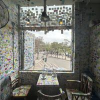 Try to bag a seat near the window for views of the lake  at The Note Coffee in Hoi An