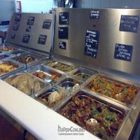 The two different cuisines (in this case mediterranean on the left and african on the right) from which you can select and create your own plate  at VlamIndePan in Haarlem