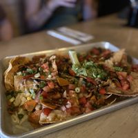 Sharing nachos   at Diego's in Newport