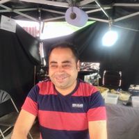 Happy Mohamed at Falafel Hummos and Salad Wrap - Market Stall in East London