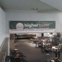 Entry to Higher Taste from inside the mall. Can be hard to find, as you tend to notice the currency exchange booth out front instead. at Higher Taste Restaurant in Wellington