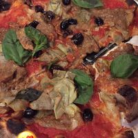 pizza with mushrooms, basil, artichokes, and olives at Pizza in Trevi in Rome