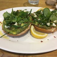 Avocado bagel with chilli flakes and vegan feta at Roots in Edinburgh