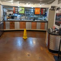 View of raw bar area veggies are along the back with noodles, meat is on the left, sauces just out of this picture on the left. at Fire + Ice in South Lake Tahoe