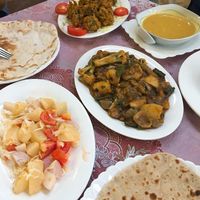 Pakoras, dal soup, mixed veg curry, parota, potato tomato salad, chapati at Namaaste Kitchen in Nyaungshwe