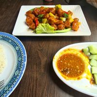 Left to right: boiled rice; sweet and sour chicken; chicken skewers w/ satay sauce at Yi Xin Vegetarian 一心素食 in Central Singapore