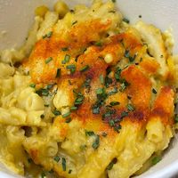 Mac and cheese- 6/10 seems fine upon opening, but consistency was dry and chewy vs gooey  at Wulf & Lamb Chelsea in London