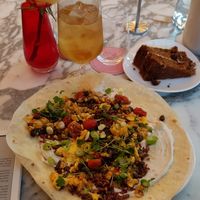 Open burrito and carrot cake at Wulf & Lamb Chelsea in London