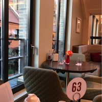 Interior upstairs - you order at the counter first and then take a table number at Wulf & Lamb Chelsea in London