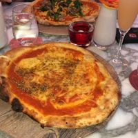 Vegan Margherita and broccoli/artichoke pizza at Wulf & Lamb Chelsea in London