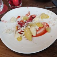 Eton Mess [£7.95] - Strawberries with pineapple mousse, whipped cream and vanilla meringue at Wulf & Lamb Chelsea in London