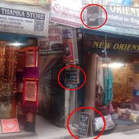 signs showing the way at Paryatan Marg at The Cafe With No Name in Kathmandu