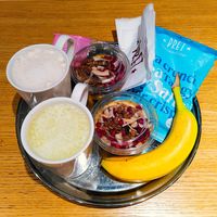 Vegan things (banana, potato chips, mango/granola pudding, almond-covered chocolates and drinks) at Pret A Manger - Av Marceau in Paris