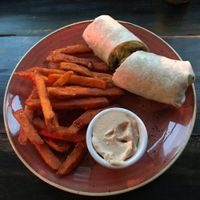 Hoisin ducky wrap with sweet potato fries  at The Pipeline in Brighton