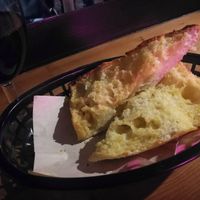 Garlic bread with small wine at The Pipeline in Brighton