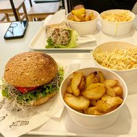 Burger, potatoes and coleslaw  at Krowarzywa in Wroclaw